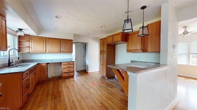 400 Ticonderoga Rd, Virginia Beach, VA 23462 - kitchen with brown cabinetry, light wood-style floors, open shelves, recessed lighting, and hanging light fixtures