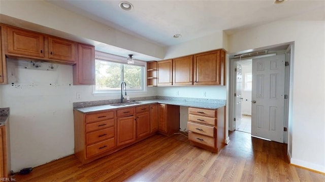400 Ticonderoga Rd, Virginia Beach, VA 23462 - kitchen featuring brown cabinets, light wood-style floors, and open shelves