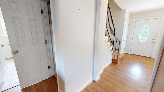 400 Ticonderoga Rd, Virginia Beach, VA 23462 - foyer entrance featuring light wood-style flooring and stairs