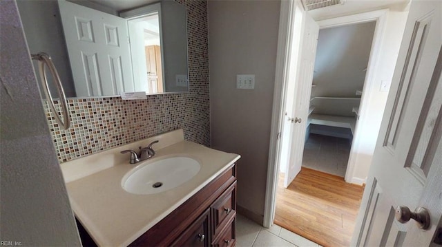 400 Ticonderoga Rd, Virginia Beach, VA 23462 - bathroom featuring tile patterned floors, vanity, and backsplash