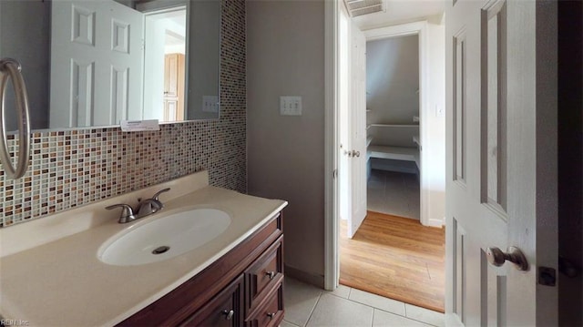 400 Ticonderoga Rd, Virginia Beach, VA 23462 - bathroom with tile patterned flooring, vanity, and decorative backsplash