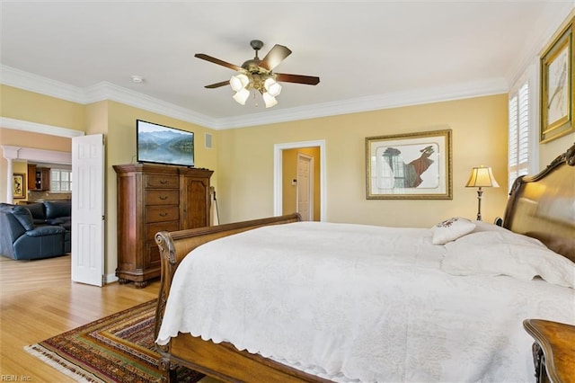 209 St Cuthbert, Williamsburg, VA 23188 - bedroom featuring crown molding, light wood finished floors, and a ceiling fan