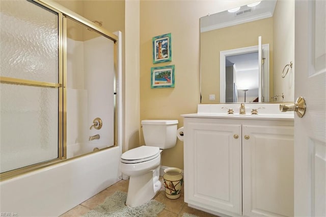 209 St Cuthbert, Williamsburg, VA 23188 - full bathroom featuring toilet, vanity, tile patterned flooring, combined bath / shower with glass door, and ornamental molding