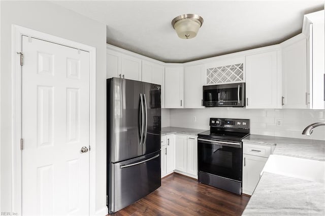 160 Ridge Rd, Poquoson, VA 23662 - kitchen with appliances with stainless steel finishes, light countertops, and white cabinets