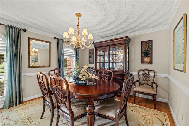 1604 Tether Keep, Virginia Beach, VA 23454 - dining area featuring a chandelier, wood finished floors, and ornamental molding
