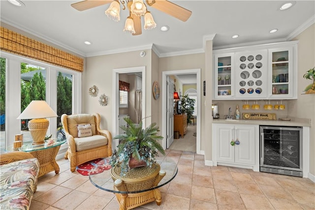 1604 Tether Keep, Virginia Beach, VA 23454 - living area with beverage cooler, a bar, a ceiling fan, ornamental molding, and recessed lighting