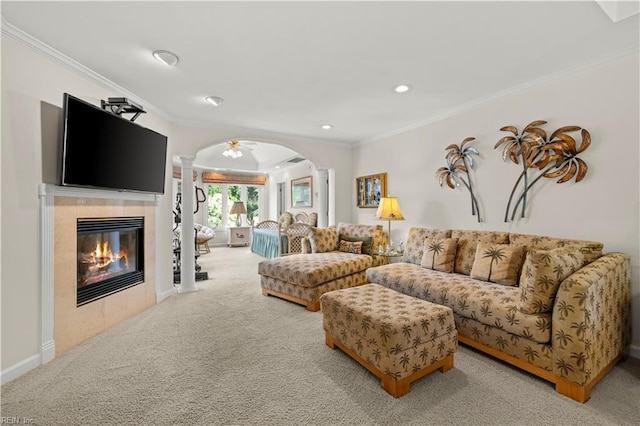 1604 Tether Keep, Virginia Beach, VA 23454 - carpeted living room featuring ornate columns, crown molding, a tile fireplace, recessed lighting, and arched walkways