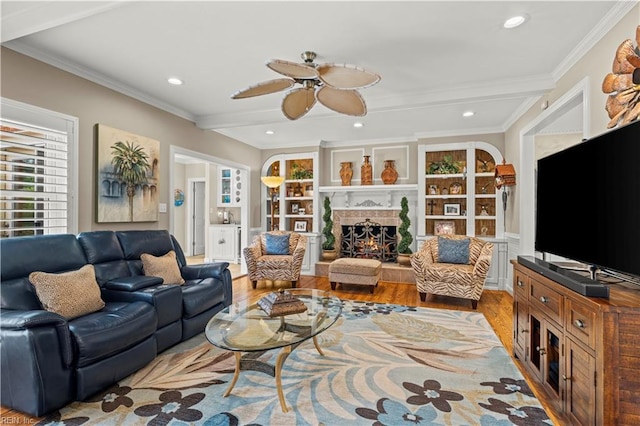 1604 Tether Keep, Virginia Beach, VA 23454 - living room featuring wood finished floors, ceiling fan, crown molding, recessed lighting, and a lit fireplace