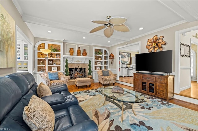 1604 Tether Keep, Virginia Beach, VA 23454 - living area featuring wood finished floors, ceiling fan, crown molding, recessed lighting, and a warm lit fireplace