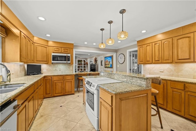 1604 Tether Keep, Virginia Beach, VA 23454 - kitchen with stainless steel appliances, recessed lighting, decorative backsplash, a kitchen island, and brown cabinets