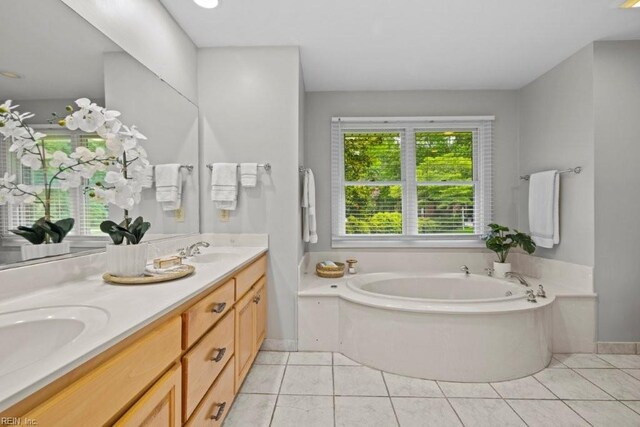 1405 Gravatt Ln, Virginia Beach, VA 23454 - full bathroom featuring double vanity, a bath, and tile patterned floors