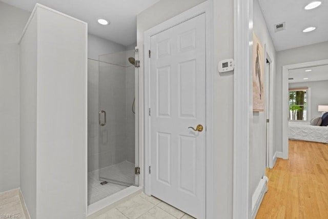 1405 Gravatt Ln, Virginia Beach, VA 23454 - ensuite bathroom featuring a shower stall, recessed lighting, and wood finished floors