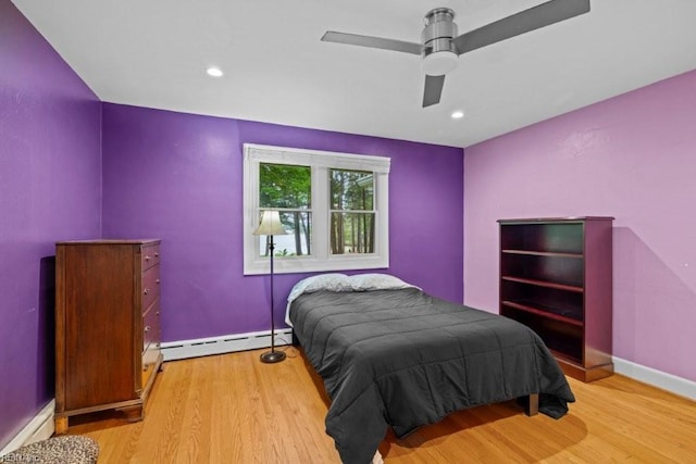 1405 Gravatt Ln, Virginia Beach, VA 23454 - bedroom featuring a baseboard radiator, wood finished floors, ceiling fan, and recessed lighting