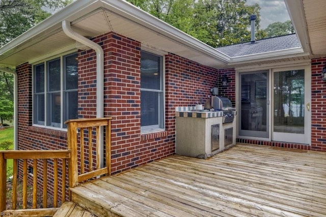 1405 Gravatt Ln, Virginia Beach, VA 23454 - wooden terrace with an outdoor kitchen