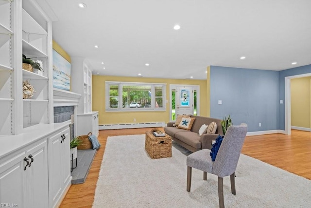 1405 Gravatt Ln, Virginia Beach, VA 23454 - living room featuring a baseboard radiator, light wood-style flooring, and recessed lighting