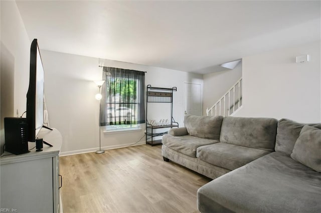 385 Susan Constant Dr, Newport News, VA 23608 - living area featuring light wood finished floors and stairway