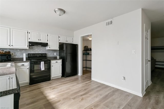 385 Susan Constant Dr, Newport News, VA 23608 - kitchen featuring black appliances, under cabinet range hood, backsplash, and white cabinets