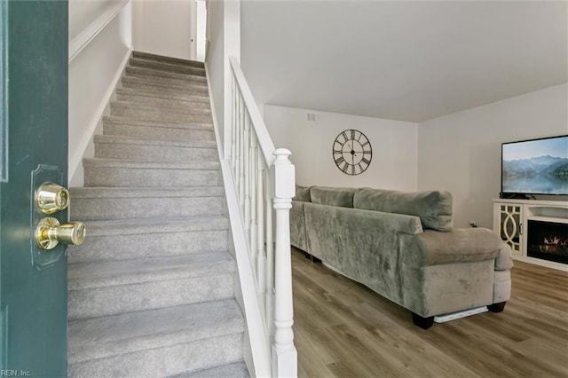 385 Susan Constant Dr, Newport News, VA 23608 - stairway featuring wood finished floors