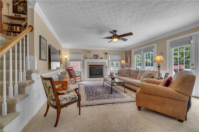 1832 Tree Line Rd, Virginia Beach, VA 23454 - carpeted living room with ornamental molding, stairway, a ceiling fan, a glass covered fireplace, and a textured ceiling