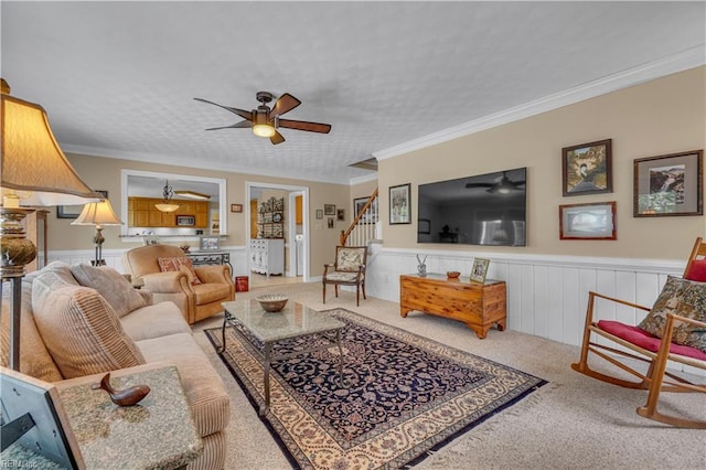 1832 Tree Line Rd, Virginia Beach, VA 23454 - carpeted living room featuring a ceiling fan, stairs, a wainscoted wall, and ornamental molding