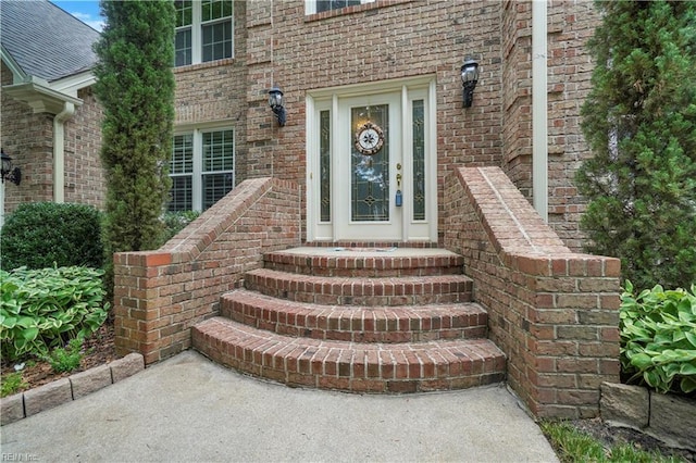 1832 Tree Line Rd, Virginia Beach, VA 23454 - view of exterior entry with brick siding and a shingled roof
