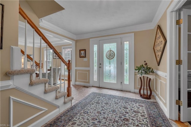 1832 Tree Line Rd, Virginia Beach, VA 23454 - tiled foyer with a decorative wall, stairs, wainscoting, and ornamental molding