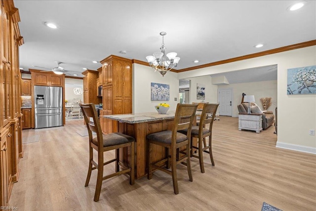1309 Taft Rd, Chesapeake, VA 23322 - dining space with ornamental molding, recessed lighting, light wood-style flooring, a chandelier, and a ceiling fan