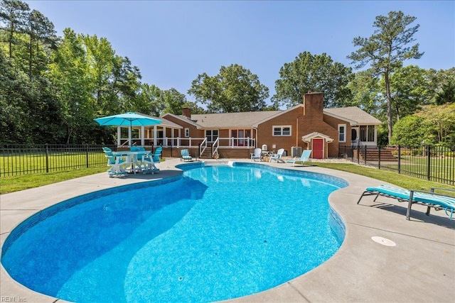 1309 Taft Rd, Chesapeake, VA 23322 - view of pool with a patio, a deck, view of scattered trees, and stairway