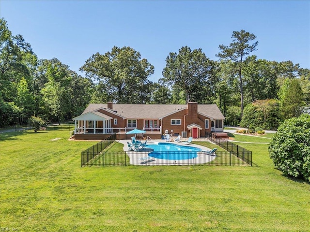 1309 Taft Rd, Chesapeake, VA 23322 - view of swimming pool featuring a patio, an outdoor structure, and view of wooded area