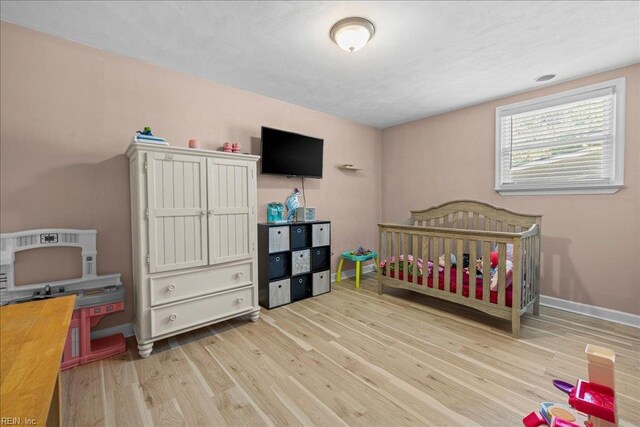 1309 Taft Rd, Chesapeake, VA 23322 - bedroom featuring wood finished floors and baseboards