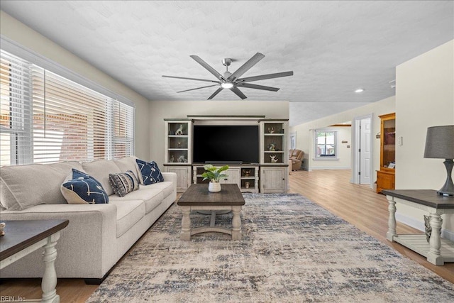 1309 Taft Rd, Chesapeake, VA 23322 - living area with a ceiling fan, wood finished floors, and a textured ceiling