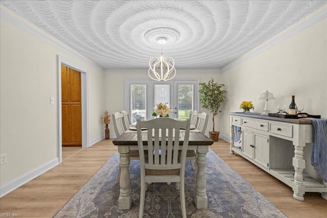 1309 Taft Rd, Chesapeake, VA 23322 - dining space featuring a chandelier, crown molding, and light wood finished floors
