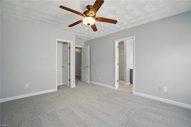 5217 Maracas Arch Arch Unit 50, Virginia Beach, VA 23462 - unfurnished bedroom with a spacious closet, light colored carpet, and ceiling fan
