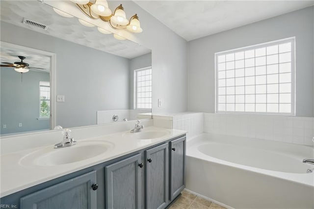 5217 Maracas Arch Arch Unit 50, Virginia Beach, VA 23462 - full bath featuring a garden tub, double vanity, a ceiling fan, and tile patterned flooring