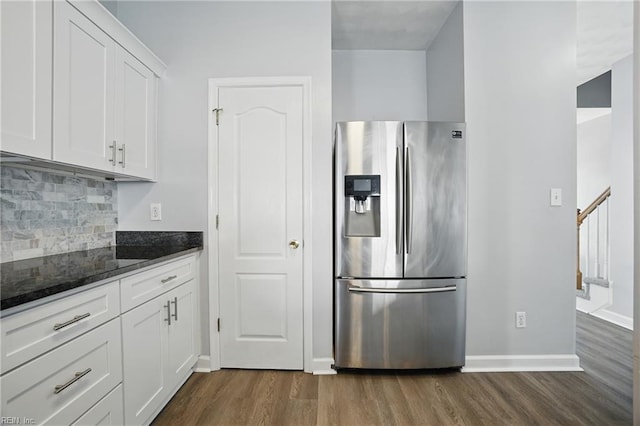 5217 Maracas Arch Arch Unit 50, Virginia Beach, VA 23462 - kitchen featuring stainless steel refrigerator with ice dispenser, dark wood finished floors, dark stone counters, and backsplash