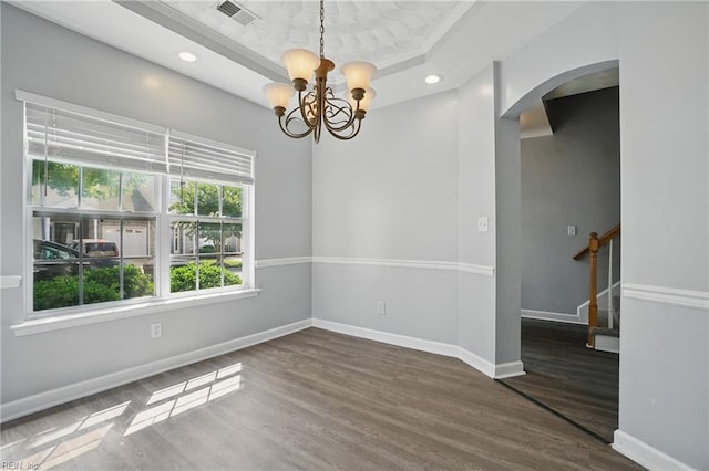 5217 Maracas Arch Arch Unit 50, Virginia Beach, VA 23462 - spare room featuring arched walkways, wood finished floors, a raised ceiling, a chandelier, and recessed lighting