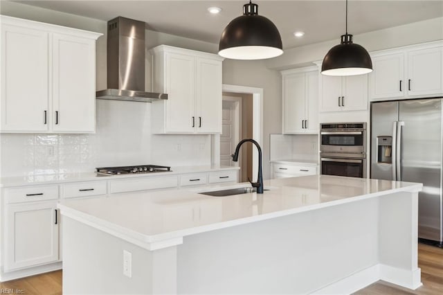 108 Robert Bruce Rd, Poquoson, VA 23662 - kitchen featuring wall chimney exhaust hood, stainless steel appliances, white cabinets, light wood-style floors, and recessed lighting
