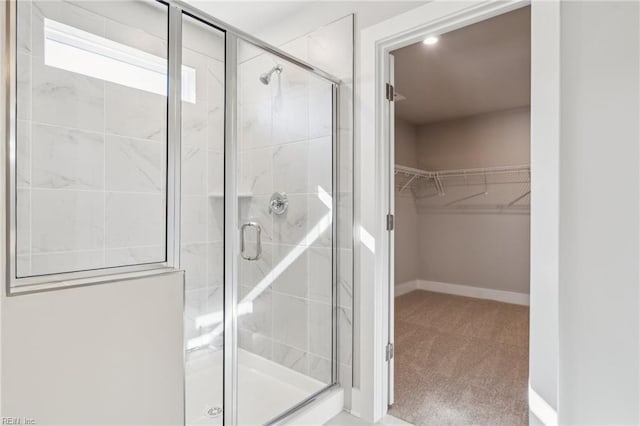 108 Robert Bruce Rd, Poquoson, VA 23662 - bathroom featuring a stall shower and a walk in closet