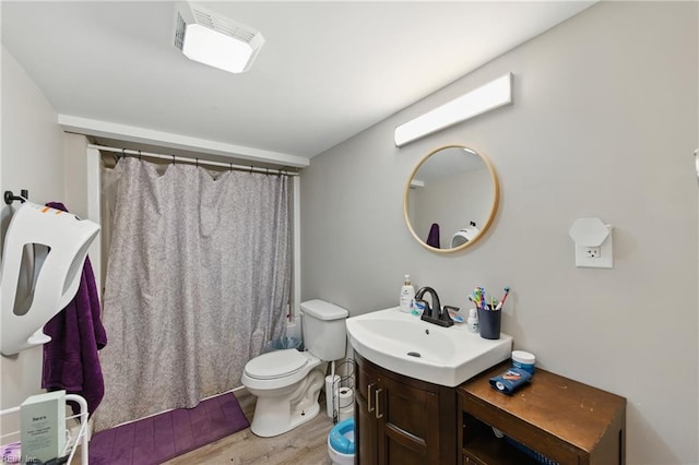 313 Saint James Ave, Suffolk, VA 23434 - bathroom with vanity, wood finished floors, and a shower with shower curtain