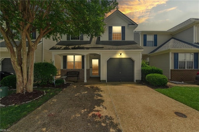 4 Angelia Way, Hampton, VA 23663 - view of front of property featuring covered porch, a garage, and concrete driveway