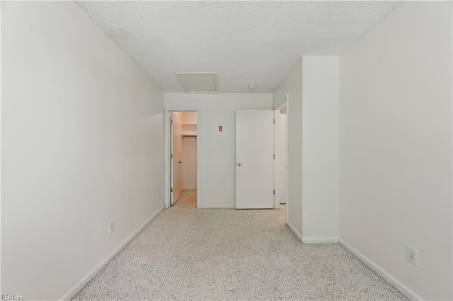 4 Angelia Way, Hampton, VA 23663 - hallway featuring attic access, carpet flooring, and a textured ceiling