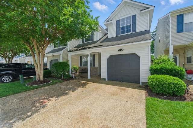 4 Angelia Way, Hampton, VA 23663 - view of front of house with an attached garage, driveway, and a shingled roof
