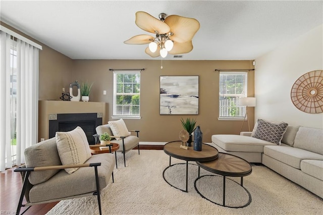 4 Angelia Way, Hampton, VA 23663 - living room featuring wood finished floors, ceiling fan, and a glass covered fireplace