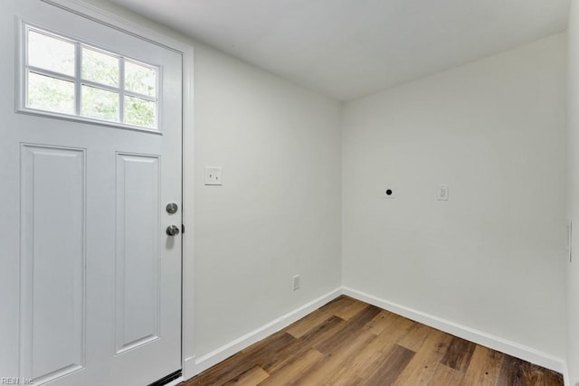17308 Pittman Rd, Boykins, VA 23827 - doorway to outside featuring wood finished floors and baseboards