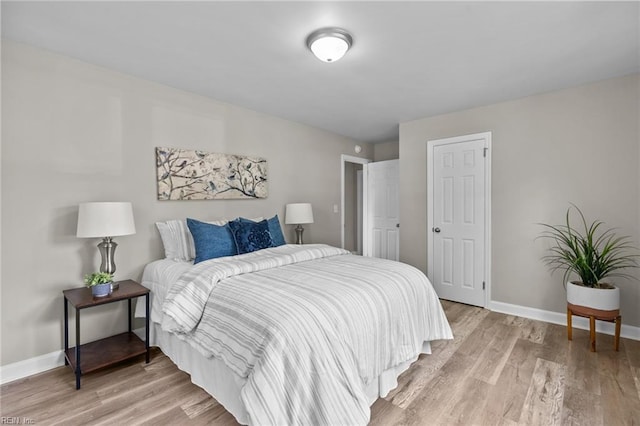1309 Wickham Ave, Newport News, VA 23607 - bedroom with light wood-type flooring and baseboards
