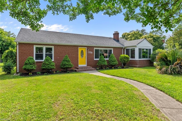 1309 Wickham Ave, Newport News, VA 23607 - ranch-style home with brick siding, a chimney, a front yard, and entry steps