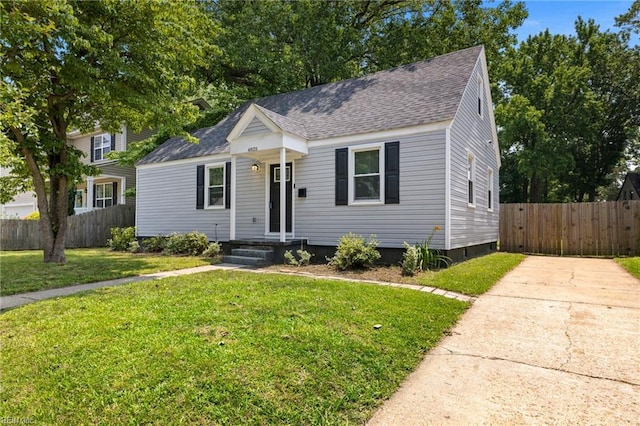4825 Robin Hood Rd, Norfolk, VA 23513 - view of front of home with a shingled roof and concrete driveway