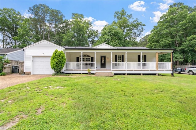 318 Hearthstone Way, Newport News, VA 23608 - view of front of house with covered porch, a garage, a front lawn, and dirt driveway