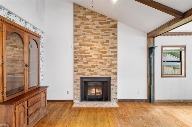 318 Hearthstone Way, Newport News, VA 23608 - unfurnished living room featuring vaulted ceiling, wood finished floors, and a fireplace