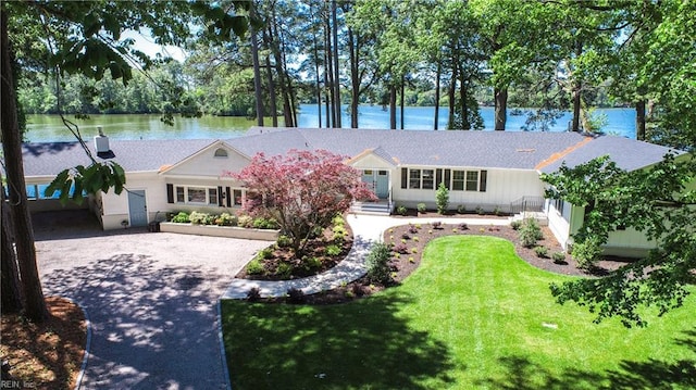 5227 Lake Shores Rd, Virginia Beach, VA 23455 - ranch-style home featuring a water view, driveway, and a front lawn